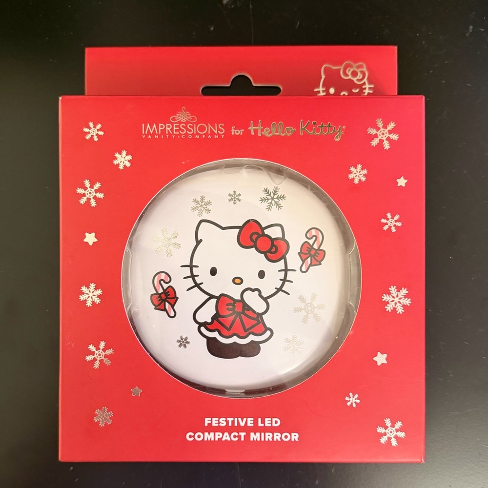 Impressions vanity Hello Kitty compact LED Mirror
Limited edition